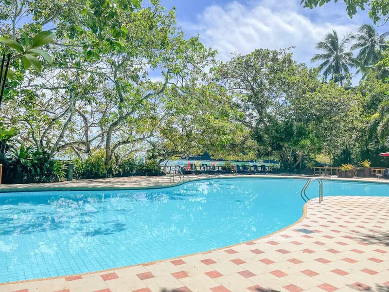 Swimming pool among the gardens at Dakak